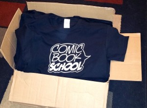 Comic Book School shirts in box